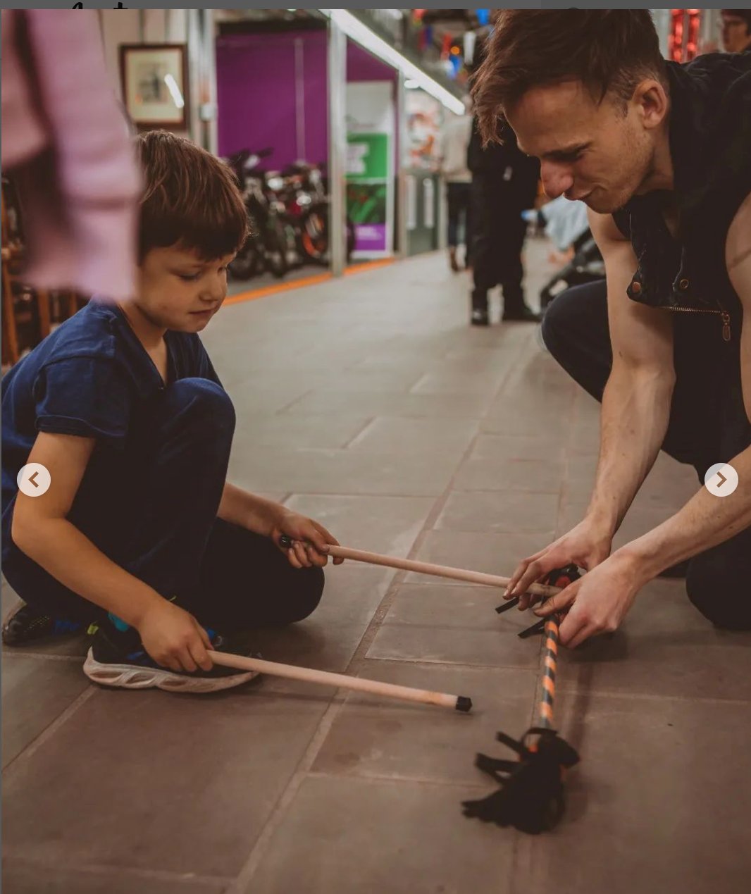 Children taking part in a hands-on circus skills workshop.
