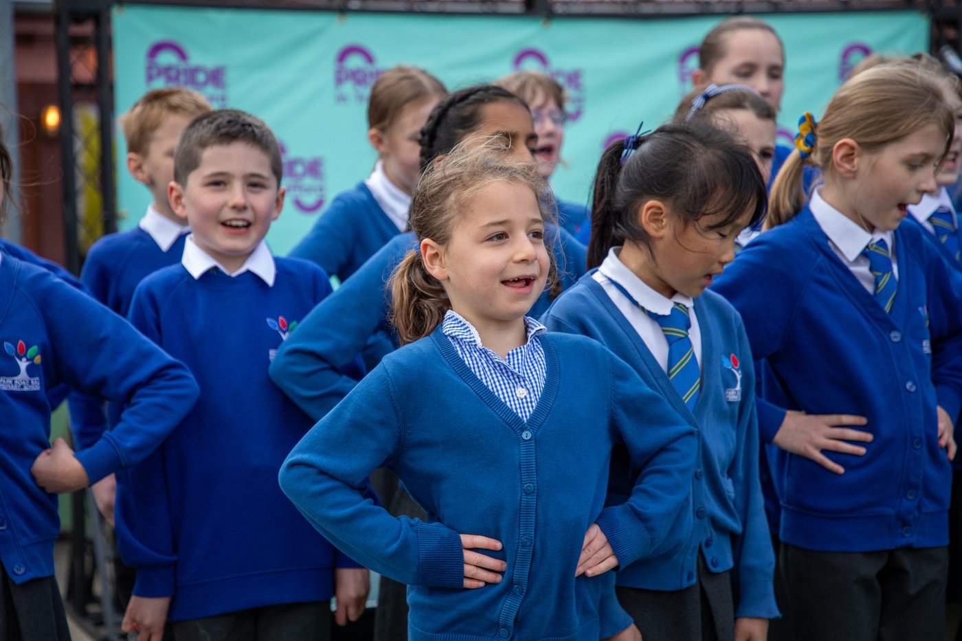 Group of school children in blue uniform