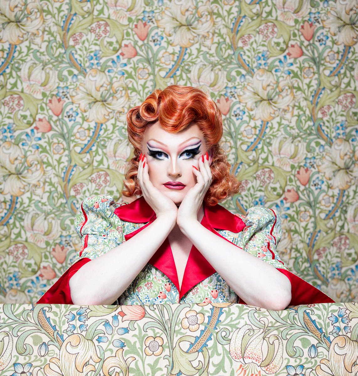 Kate Butch looking beautiful leaning on a sofa