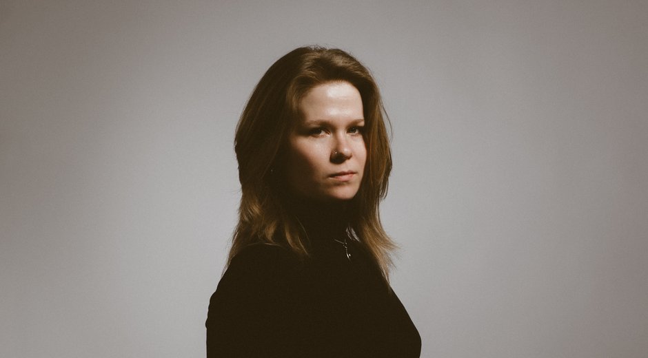 Katie Spencer dressed in black looking at the camera