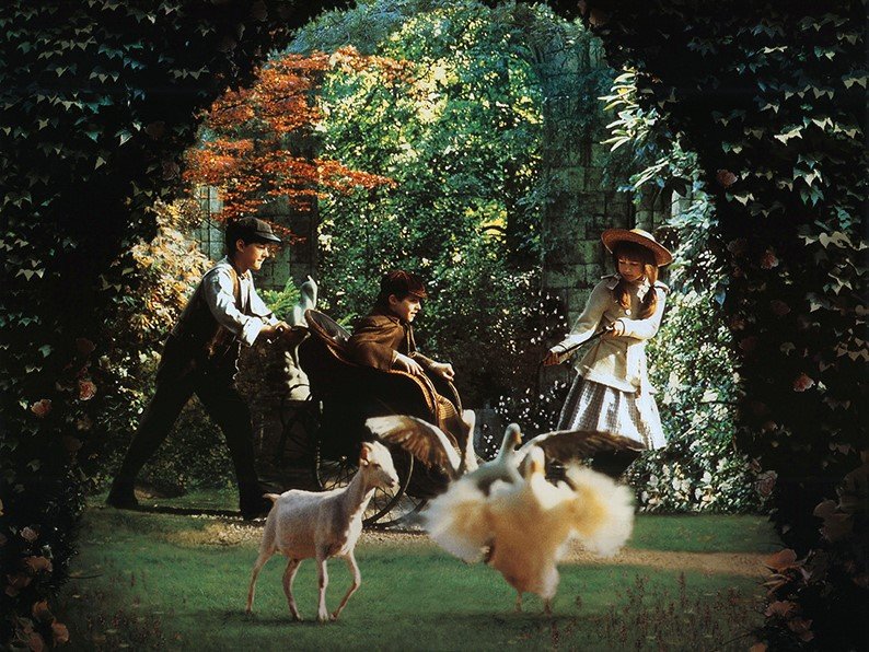 Image from the film with three children in a garden