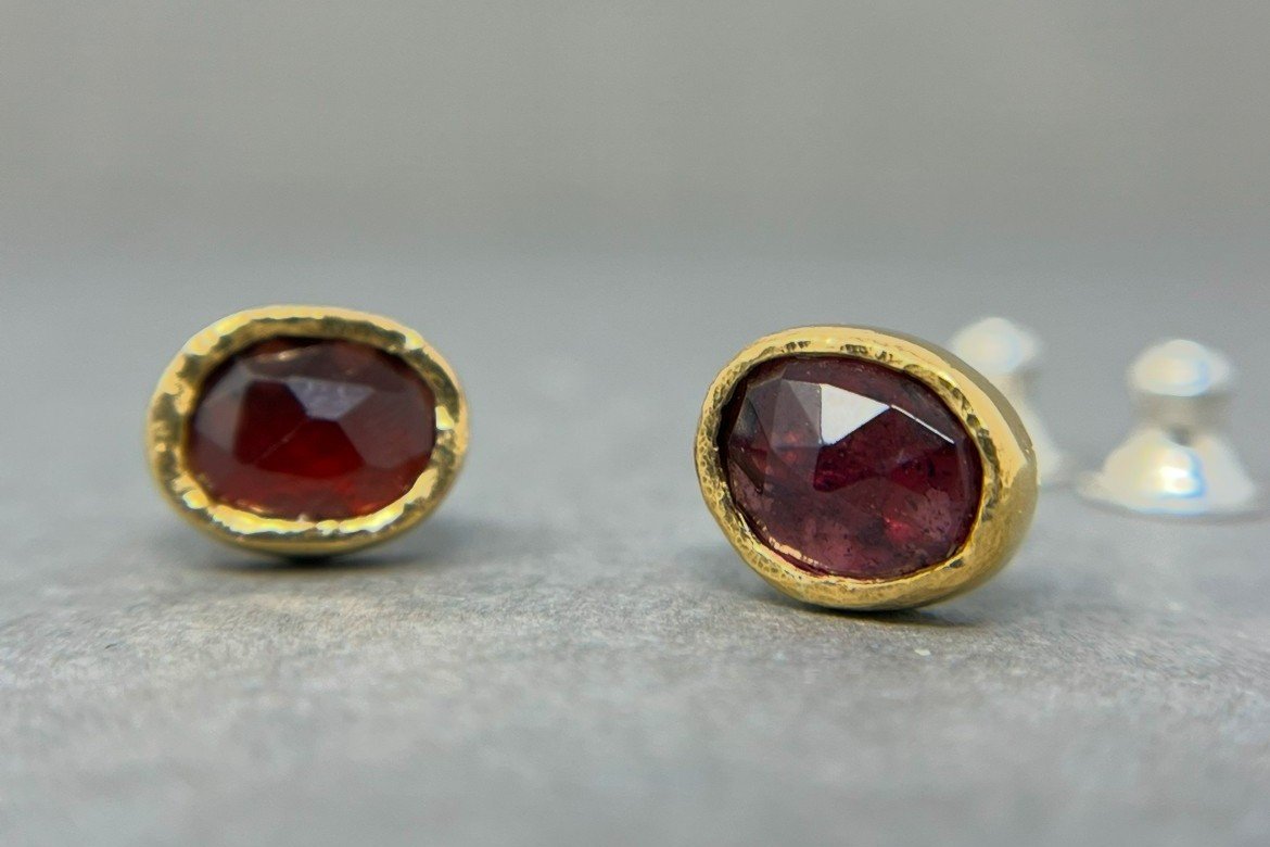 Gold rings and ruby inlays