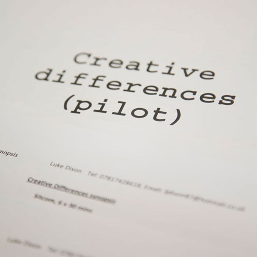 This image is a close-up photograph of a printed document, captured at an angle with a shallow depth of field.