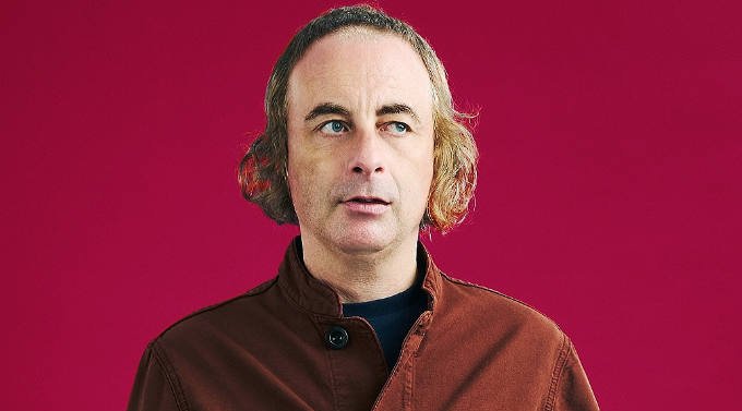 a picture of paul foot with a red background